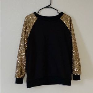 Gold sequin and black sweater